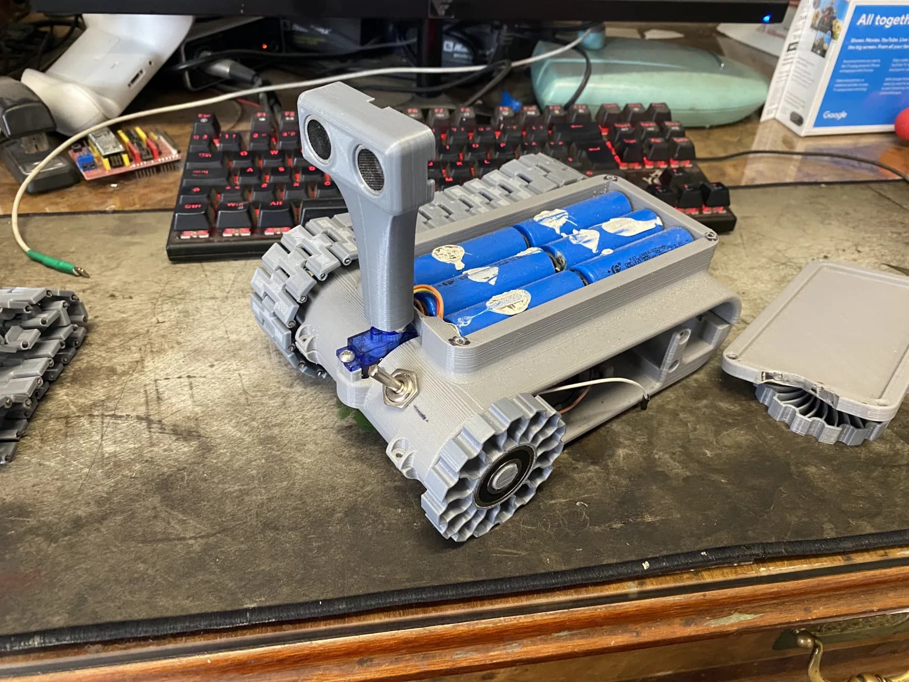 Mobile robot prototype assembled with 3D-printed structural parts